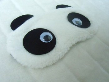 Masque de sommeil tête de panda yeux mobiles
